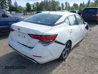 2022 Nissan Sentra SV z VIN 3N1AB8CV1NY272528, wystawiony jako IAAI lot #42344178 z przebiegiem 50 569 mil mil oraz . Historia ofert i sprzedaży dostępna na DreamBid. Obrazek 4.