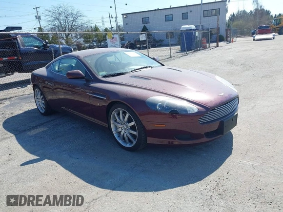 2005 Aston Martin DB9 z VIN SCFAD01A75GA01262, wystawiony jako IAAI lot #41937486 z przebiegiem 35 538 mil mil oraz . Historia ofert i sprzedaży dostępna na DreamBid. Obrazek 1.