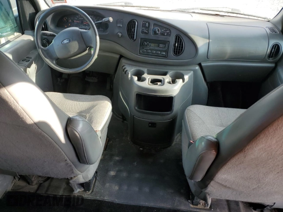 2004 Ford Econoline Passenger XL with VIN 1FMRE11W54HB15178, listed as a Copart auction lot 83088104 with 248,516 mi miles and Salvage Title. Bid and sale history available at DreamBid. Image 8.