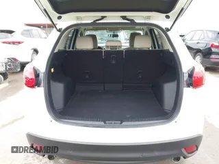 2015 Mazda CX-5 Touring with VIN JM3KE2CY3F0550624, listed as a IAAI auction lot 41931268 with 51,588 mi miles and . Bid and sale history available at carsss.com. Image 17.