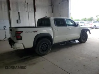 2022 Nissan Frontier Pro-4X z VIN 1N6ED1EK9NN692552, wystawiony jako Copart lot #55795375 z przebiegiem 29 171 mil mil oraz Szkoda całkowita • Salvage title. Historia ofert i sprzedaży dostępna na DreamBid. Obrazek 3.