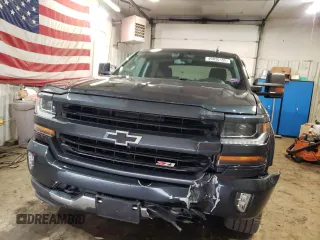 2018 Chevrolet Silverado 1500 LT with VIN 3GCUKREC5JG121283, listed as a Copart auction lot 49836155 with 95,838 mi miles and Salvage Title. Bid and sale history available at DreamBid. Image 5.