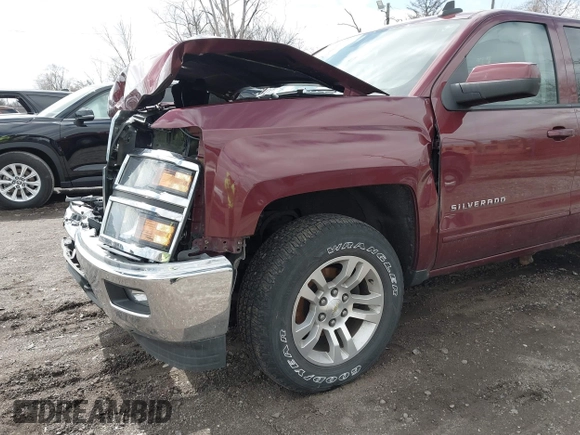 2015 Chevrolet Silverado 1500 LT with VIN 1GCVKREC5FZ151119, listed as a IAAI auction lot 41904778 with 122,209 mi miles and . Bid and sale history available at DreamBid. Image 6.