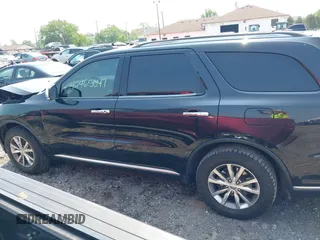 2014 Dodge Durango Limited with VIN 1C4RDJDG5EC532942, listed as a IAAI auction lot 42465047 with 116,617 mi miles and . Bid and sale history available at DreamBid. Image 14.