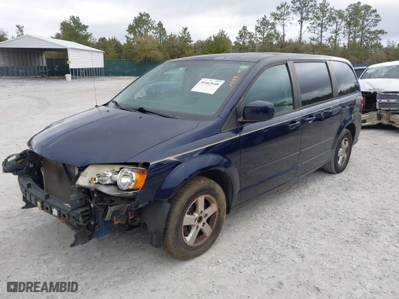 2012 Dodge Grand Caravan SE with VIN 2C4RDGBG3CR328103, listed as a IAAI auction lot 41463648 with 115,186 mi miles. Bid and sale history available at carsss.com. Image 16.