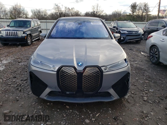 2023 BMW iX xDrive50 with VIN WB523CF03PCL64040, listed as a Copart auction lot 36400593 with 1,399 mi miles. Bid and sale history available at carsss.com. Image 5.