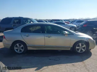 2007 Honda Civic Sdn EX with VIN 1HGFA16827L091969, listed as a IAAI auction lot 41669543 with 207,441 mi miles. Bid and sale history available at carsss.com. Image 13.