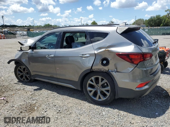 2017 Hyundai Santa Fe Ultimate z VIN 5XYZW4LA8HG491652, wystawiony jako Copart lot #56907985 z przebiegiem Nie podano mil oraz Szkoda całkowita • Salvage title. Historia ofert i sprzedaży dostępna na DreamBid. Obrazek 2.