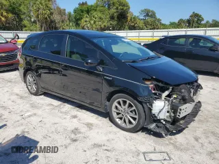 2017 Toyota Prius v Two with VIN JTDZN3EU2HJ067274, listed as a Copart auction lot 50703205 with 59,522 mi miles and Salvage Title. Bid and sale history available at carsss.com. Image 4.