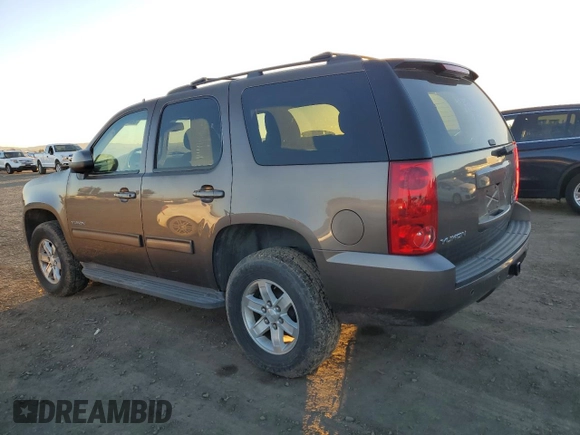 2013 GMC Yukon SLE with VIN 1GKS1AE05DR313734, listed as a Copart auction lot 39047363 with 97,303 mi miles and Salvage Title. Bid and sale history available at carsss.com. Image 2.