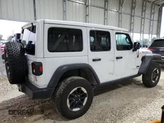 2022 Jeep Wrangler Unlimited Rubicon with VIN 1C4HJXFN8NW129717, listed as a Copart auction lot 54615745 with 33,544 mi miles and Salvage title. Bid and sale history available at DreamBid. Image 3.