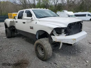 2015 Ram 3500 Tradesman with VIN 3C63RRGL7FG595707, listed as a Copart auction lot 51674755 with 201,308 mi miles and Salvage Title. Bid and sale history available at carsss.com. Image 4.