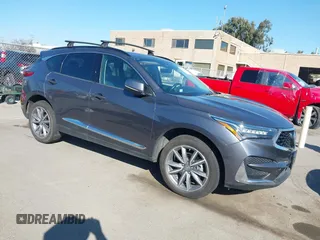 2019 Acura RDX w/Technology Pkg with VIN 5J8TC2H51KL000186, listed as a IAAI auction lot 41403335 with 140,920 mi miles. Bid and sale history available at carsss.com. Image 1.
