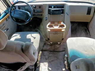 1995 Chevrolet Chevy Van с VIN 1GBEG25K9SF141922, выставлен на аукционе Copart как лот 58589795 с пробегом 77 242 миль миль и Списание • Salvage title. История ставок и продаж доступна на DreamBid. Изображение 8.