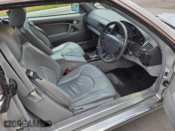 1996 Mercedes-Benz SL 320 with VIN WDBFA63F4TF138117, listed as a Copart auction lot 63440965 with 56,621 mi miles and Clean title. Bid and sale history available at DreamBid. Image 9.