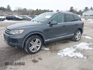 2012 Volkswagen Touareg Sport z VIN WVGEF9BP4CD008517, wystawiony jako IAAI lot #41386971 z przebiegiem 179 306 mil mil oraz . Historia ofert i sprzedaży dostępna na DreamBid. Obrazek 17.