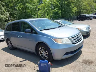 2011 Honda Odyssey EX-L with VIN 5FNRL5H60BB051135, listed as a IAAI auction lot 42588994 with 195,112 mi miles and . Bid and sale history available at DreamBid. Image 1.