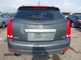 2012 Cadillac SRX Luxury Collection z VIN 3GYFNAE39CS659562, wystawiony jako IAAI lot #42109525 z przebiegiem 151 051 mil mil oraz . Historia ofert i sprzedaży dostępna na DreamBid. Obrazek 16.