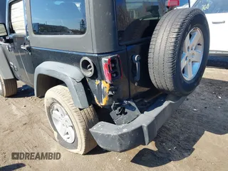 2014 Jeep Wrangler Sport with VIN 1C4AJWAG1EL314651, listed as a IAAI auction lot 41881814 with 222,483 mi miles and . Bid and sale history available at carsss.com. Image 6.