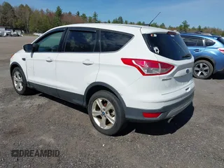 2013 Ford Escape SE with VIN 1FMCU0GXXDUA73875, listed as a IAAI auction lot 42164115 with 195,712 mi miles and . Bid and sale history available at carsss.com. Image 3.
