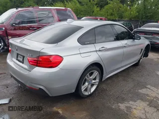 2016 BMW 4 Series 428i xDrive z VIN WBA4C9C57GG137858, wystawiony jako IAAI lot #42755021 z przebiegiem 92 728 mil mil oraz . Historia ofert i sprzedaży dostępna na DreamBid. Obrazek 4.