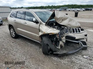 2014 Jeep Grand Cherokee Summit с VIN 1C4RJFJG8EC219264, выставлен на аукционе Copart как лот 57696025 с пробегом Не указан миль и Списание • Salvage title. История ставок и продаж доступна на DreamBid. Изображение 4.
