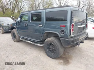 2005 Hummer H2 SUV z VIN 5GRGN23U95H100888, wystawiony jako IAAI lot #41937351 z przebiegiem 202 969 mil mil oraz . Historia ofert i sprzedaży dostępna na DreamBid. Obrazek 3.
