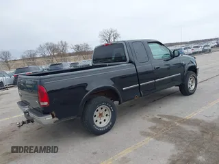 1998 Ford F-150 with VIN 1FTZX1868WKA44830, listed as a IAAI auction lot 41851933 with 240,813 mi miles and . Bid and sale history available at DreamBid. Image 4.