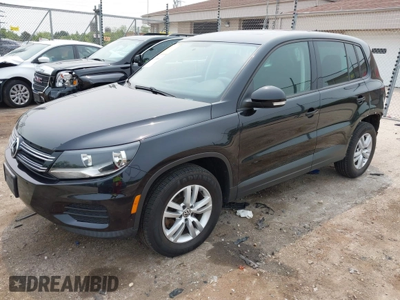 2013 Volkswagen Tiguan S with VIN WVGAV3AX2DW594334, listed as a IAAI auction lot 42405989 with 96,559 mi miles and . Bid and sale history available at DreamBid. Image 2.