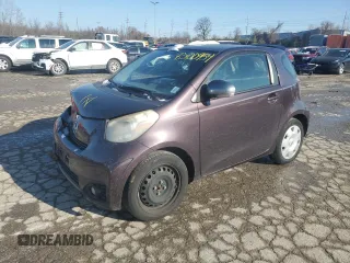 2012 Scion iQ z VIN JTNJJXB00CJ014966, wystawiony jako Copart lot #83100954 z przebiegiem 100 775 mil mil oraz Szkoda całkowita • Salvage title. Historia ofert i sprzedaży dostępna na DreamBid. Obrazek 1.