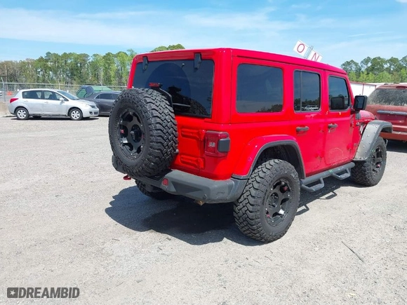 2020 Jeep Wrangler Unlimited Rubicon with VIN 1C4HJXFG9LW106607, listed as a IAAI auction lot 41908295 with 71,083 mi miles. Bid and sale history available at carsss.com. Image 4.