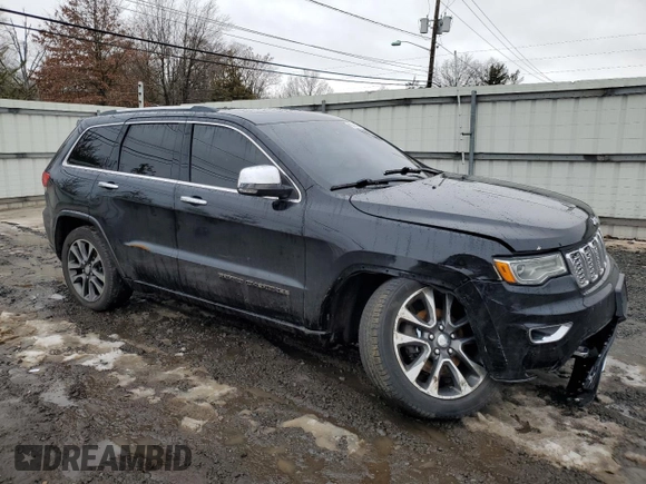 2017 Jeep Grand Cherokee Overland with VIN 1C4RJFCGXHC927470, listed as a Copart auction lot 45132185 with 119,543 mi miles and Salvage Title. Bid and sale history available at carsss.com. Image 4.