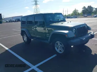2007 Jeep Wrangler Unlimited X with VIN 1J4GB39117L187404, listed as a IAAI auction lot 41981508 with 128,643 mi miles and . Bid and sale history available at DreamBid. Image 1.