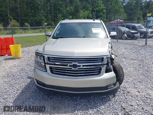 2015 Chevrolet Tahoe LT z VIN 1GNSCBKC7FR140125, wystawiony jako IAAI lot #42279760 z przebiegiem 201 335 mil mil oraz . Historia ofert i sprzedaży dostępna na DreamBid. Obrazek 12.