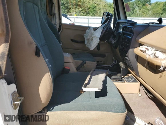 2000 Jeep Wrangler Sahara with VIN 1J4FA59SXYP764539, listed as a Copart auction lot 52707385 with 136,159 mi miles and Salvage title. Bid and sale history available at DreamBid. Image 10.