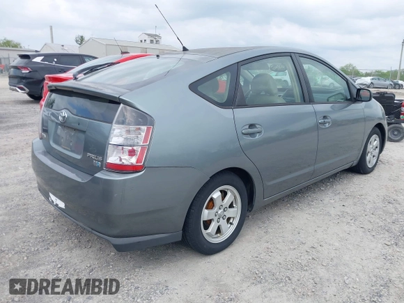 2005 Toyota Prius with VIN JTDKB20UX53104972, listed as a IAAI auction lot 42233026 with 228,920 mi miles and . Bid and sale history available at DreamBid. Image 4.