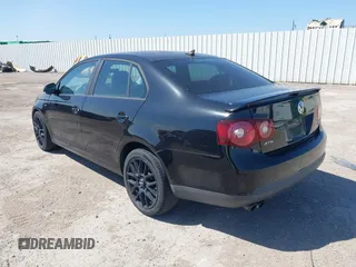 2008 Volkswagen Jetta Sedan Wolfsburg with VIN 3VWRJ71K08M175125, listed as a IAAI auction lot 42087215 with 150,813 mi miles. Bid and sale history available at carsss.com. Image 3.