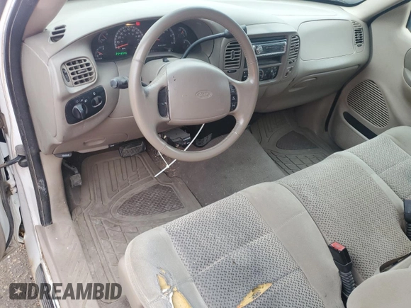 2002 Ford F-150 XL with VIN 1FTRX17L52KC49698, listed as a Copart auction lot 54307145 with 254,394 mi miles and Salvage title. Bid and sale history available at DreamBid. Image 8.