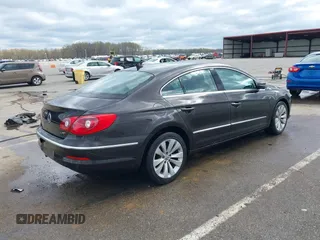 2010 Volkswagen CC Lux Plus with VIN WVWHN7AN6AE541937, listed as a IAAI auction lot 42018765 with 107,110 mi miles. Bid and sale history available at carsss.com. Image 4.