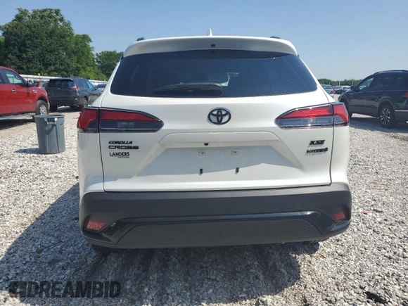 2023 Toyota Corolla Cross Hybrid S with VIN 7MUFBABG5PV008595, listed as a Copart auction lot 60002585 with 9,052 mi miles and Salvage title. Bid and sale history available at DreamBid. Image 6.
