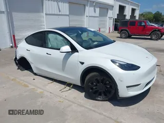 2023 Tesla Model Y Long Range with VIN 7SAYGDEE7PF865539, listed as a IAAI auction lot 42109673 with 34,923 mi miles and . Bid and sale history available at DreamBid. Image 1.