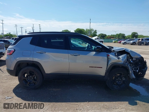 2023 Jeep Compass Trailhawk with VIN 3C4NJDDN2PT567047, listed as a IAAI auction lot 42376543 with 41,924 mi miles and . Bid and sale history available at DreamBid. Image 13.