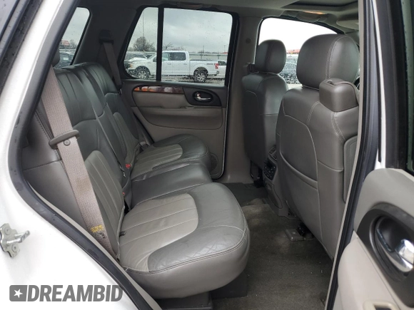 2004 GMC Envoy SLT with VIN 1GKDT13SX42404837, listed as a Copart auction lot 84515994 with 184,153 mi miles and Salvage Title. Bid and sale history available at carsss.com. Image 10.