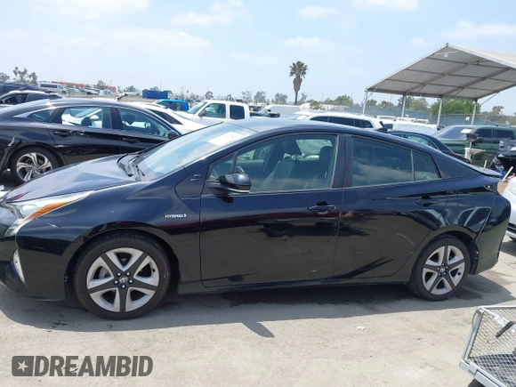 2017 Toyota Prius Two with VIN JTDKARFUXH3041668, listed as a IAAI auction lot 42421754 with 57,677 mi miles and . Bid and sale history available at DreamBid. Image 15.