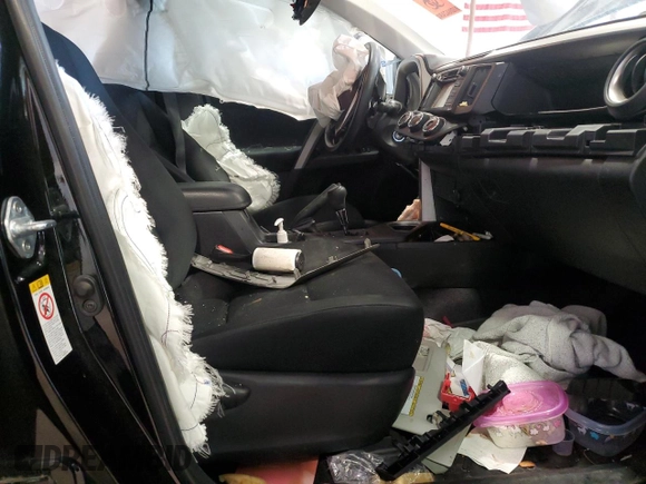2018 Toyota RAV4 LE with VIN 2T3BFREV7JW717699, listed as a Copart auction lot 60656045 with Not provided miles and Salvage title. Bid and sale history available at DreamBid. Image 7.