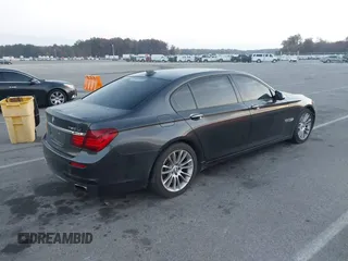 2014 BMW 7 Series ALPINA B7 with VIN WBAYE8C58ED136240, listed as a IAAI auction lot 40701912 with 116,246 mi miles. Bid and sale history available at carsss.com. Image 4.