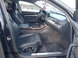 2015 Audi S8 with VIN WAUK2AFD5FN027013, listed as a IAAI auction lot 41456289 with 77,877 mi miles. Bid and sale history available at carsss.com. Image 5.