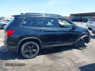 2021 Honda Passport Elite with VIN 5FNYF8H07MB003506, listed as a IAAI auction lot 42571906 with 42,323 mi miles and . Bid and sale history available at DreamBid. Image 14.