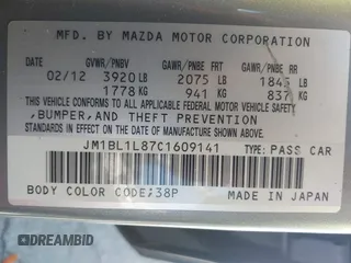 2012 Mazda Mazda3 i Touring with VIN JM1BL1L87C1609141, listed as a IAAI auction lot 41871418 with 125,253 mi miles. Bid and sale history available at carsss.com. Image 9.