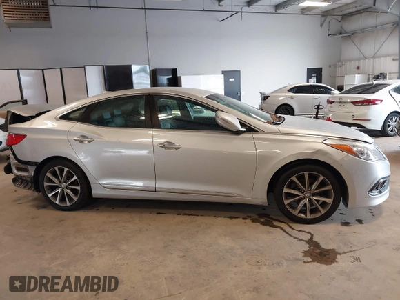 2017 Hyundai Azera with VIN KMHFG4JG7HA572726, listed as a IAAI auction lot 39691285 with 100,092 mi miles and . Bid and sale history available at DreamBid. Image 14.